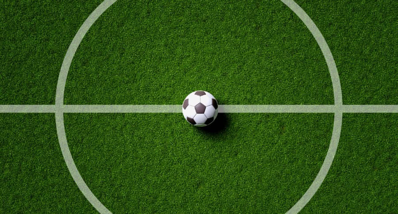 A soccer ball on a grass field
