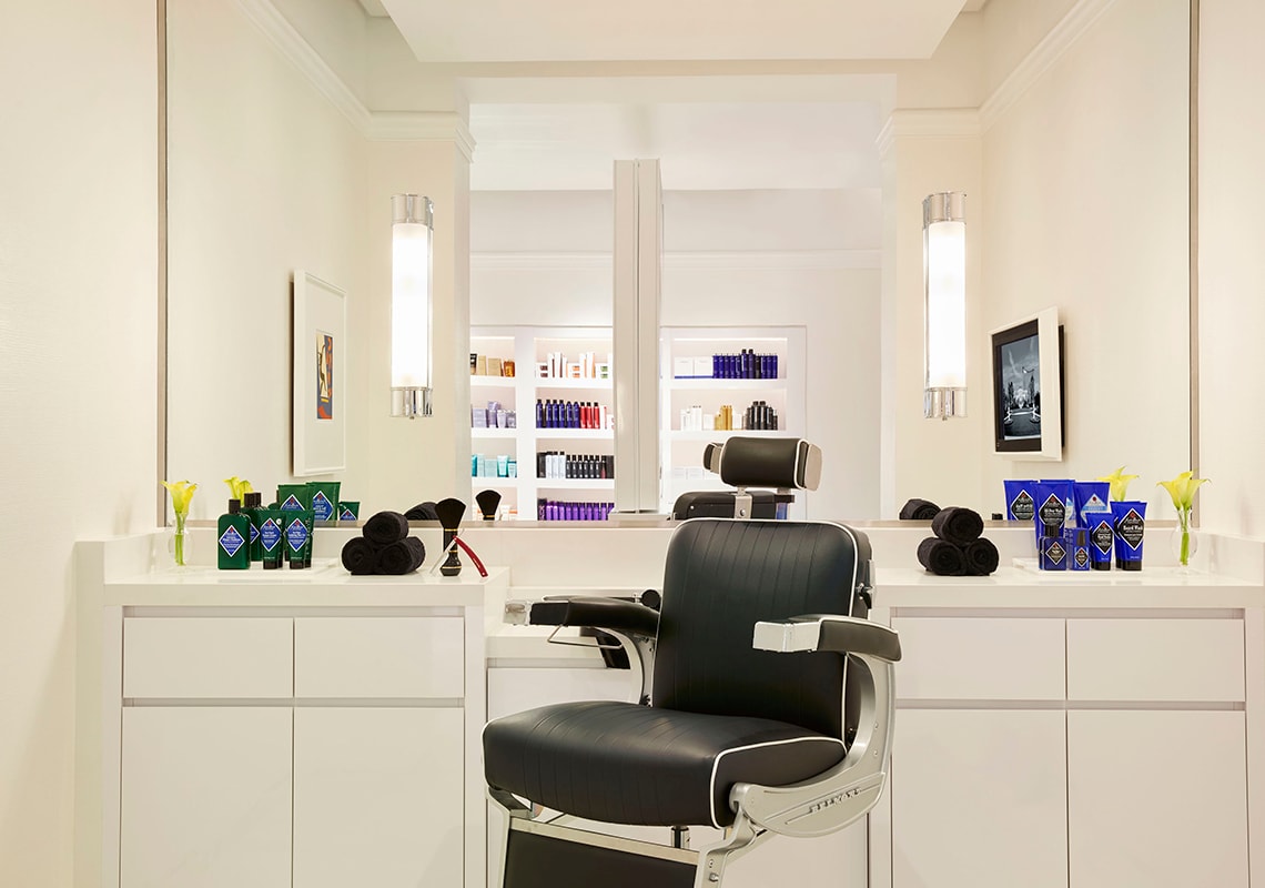 A barbers chair at the Salon at Encore Boston Harbor