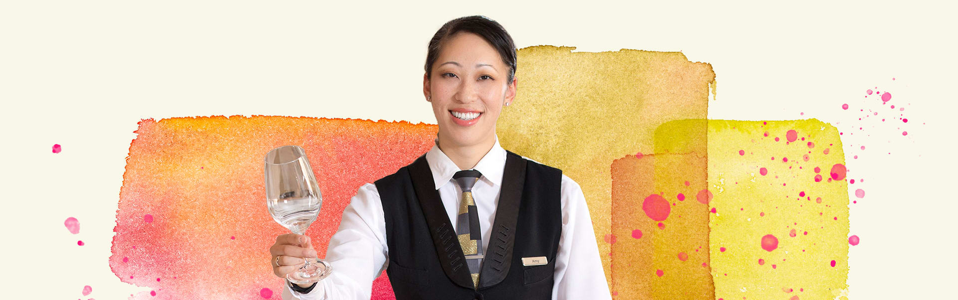 wynn employee holding wine glass