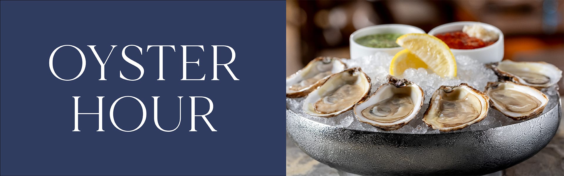 Oysters on ice with slices of lemon