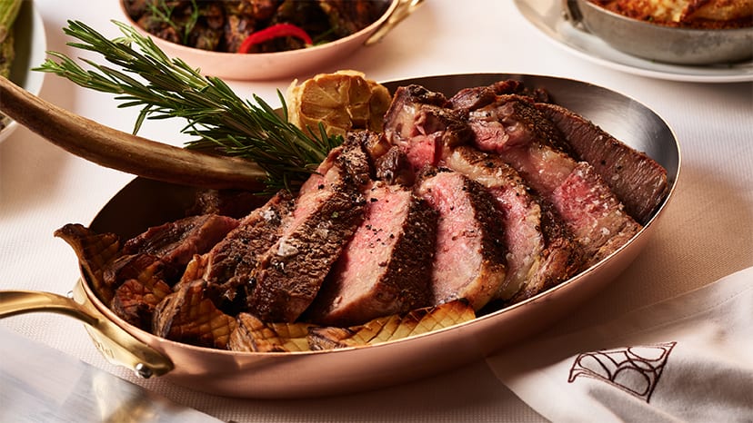 Slices of steak in a pan from Rare Steakhouse