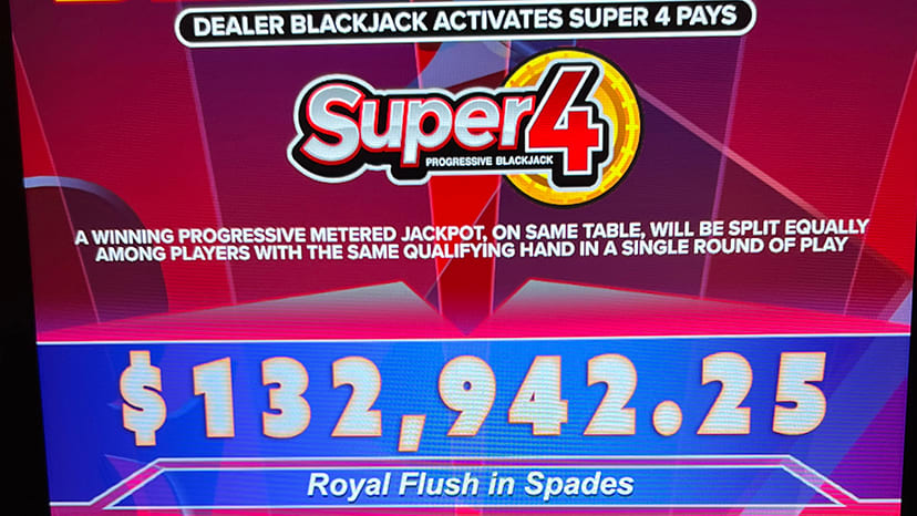 A screen showing a Super4 jackpot win of $132,942.