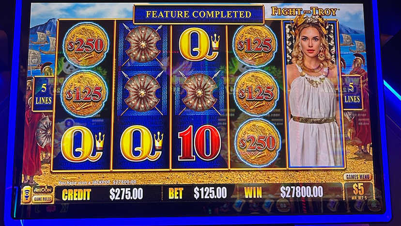 A slot machine screen showing a winner of $27,800