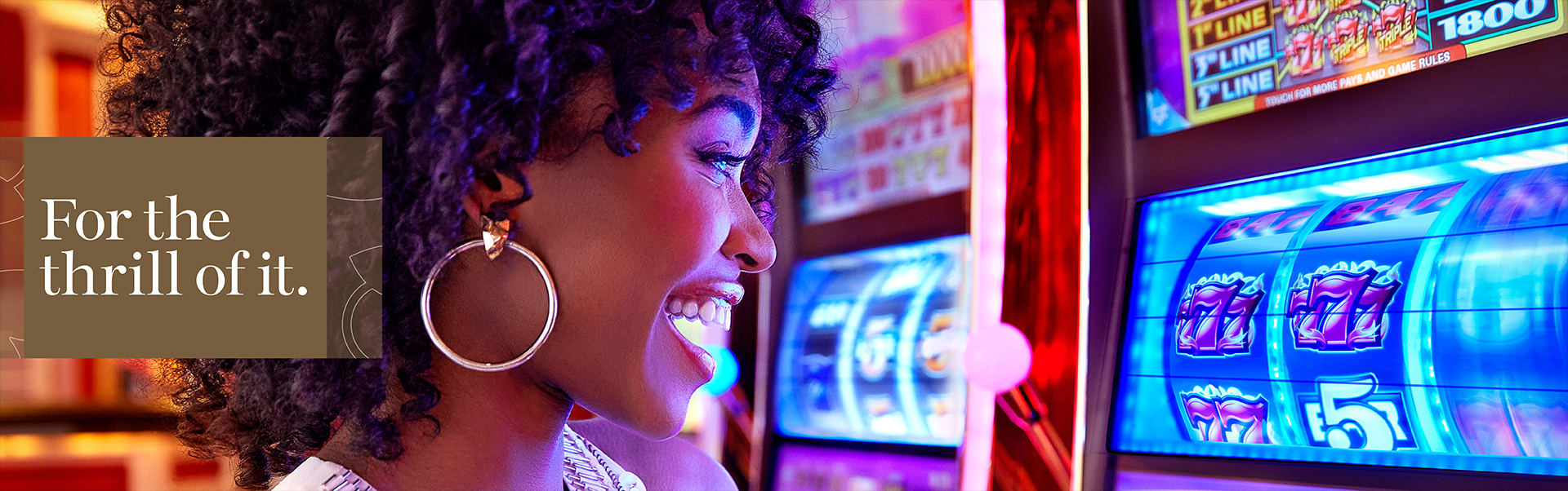 Woman playing slots at Wynn Las Vegas casino